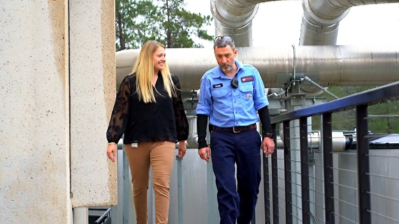 Anna Meier and a team member walking outside the Trane office in Columbia SC